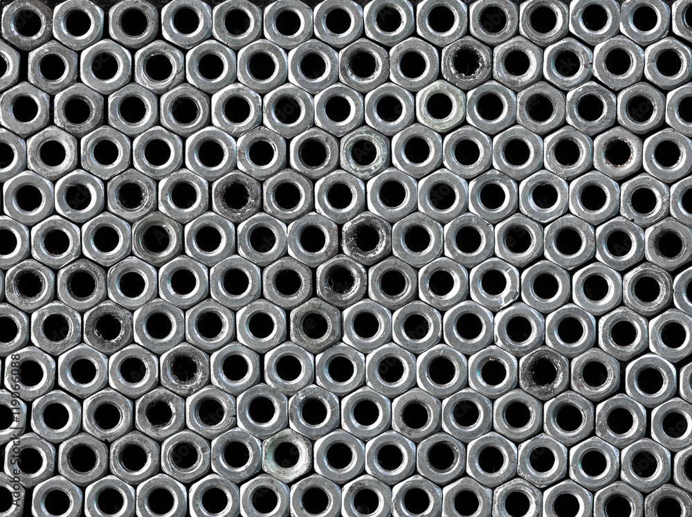 abstract background of metal nuts abstract background of metal nuts