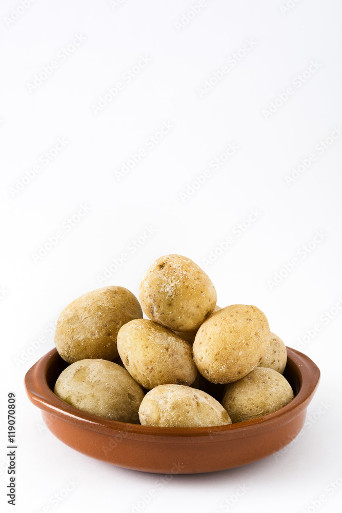 Canarian potatoes (papas arrugadas) isolated on white background
Canarian potatoes (papas arrugadas) isolated on white background
