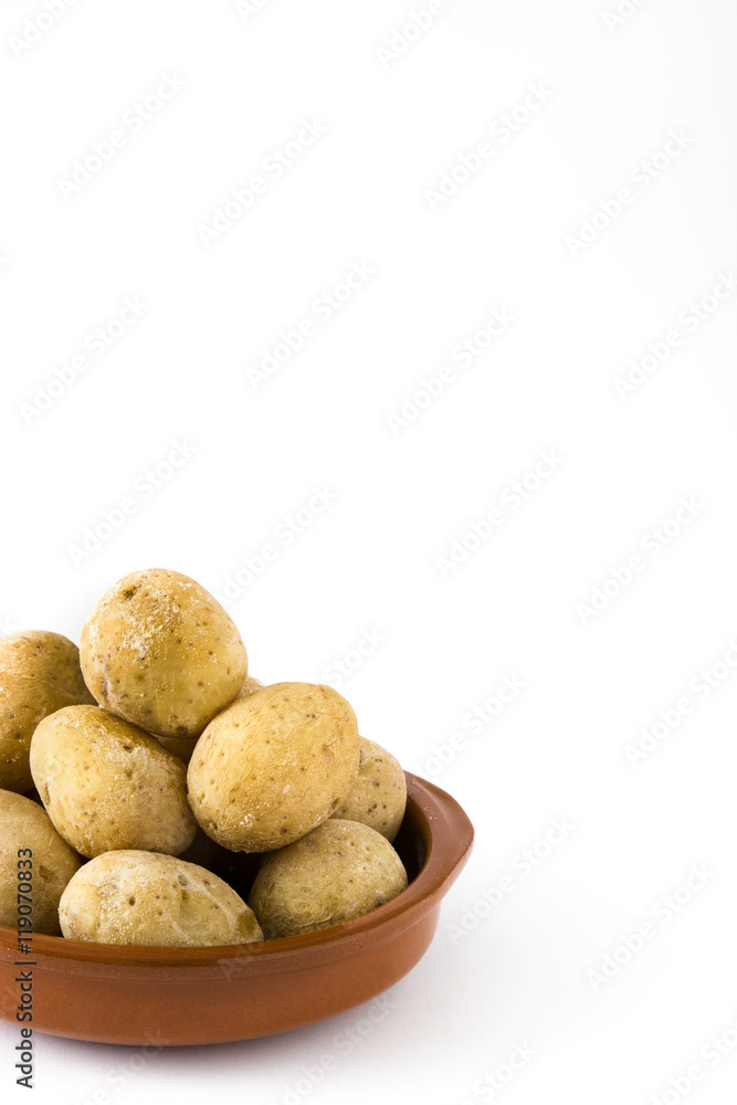 Canarian potatoes (papas arrugadas) isolated on white background
Canarian potatoes (papas arrugadas) isolated on white background