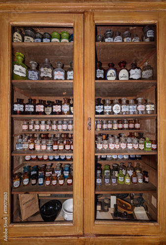 Bottles on the shelf in old pharmacy