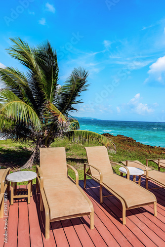 Loungers on the deck by the seafront Tobago Caribbean 