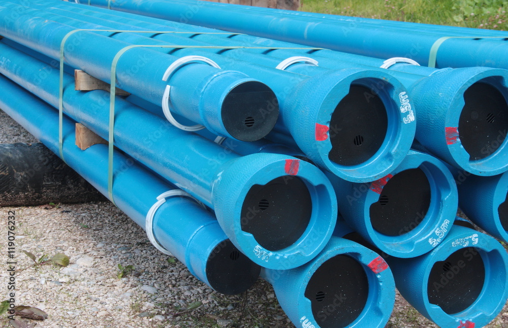 Blue PVC plastic pipes and fittings used for underground water supply and sewer lines Blue PVC plastic pipes and fittings used for underground water supply and sewer lines