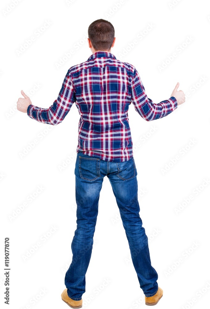 Back view of man in checkered shirt shows thumbs up. Rear view people collection. backside view of person. Isolated over white background. Back view of man in checkered shirt shows thumbs up. Rear view people collection. backside view of person. Isolated over white background.