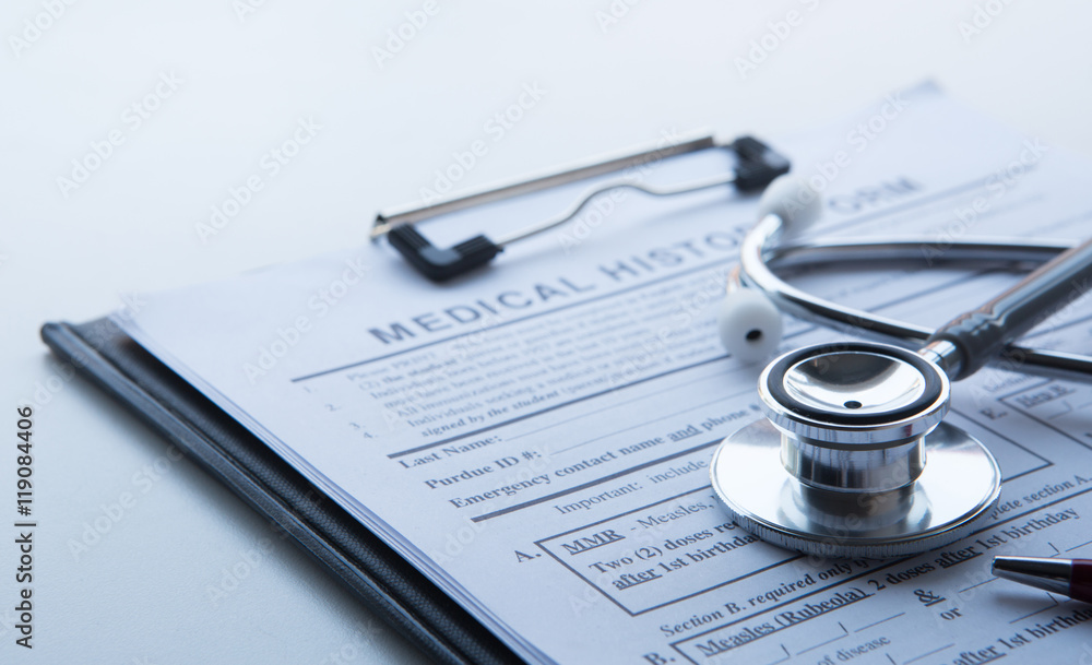 Medical concept with stethoscope on medical history form. Medical concept with stethoscope on medical history form.