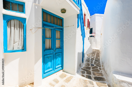 Typical white houses on street of beautiful Mykonos town, Cyclades islands, Greece