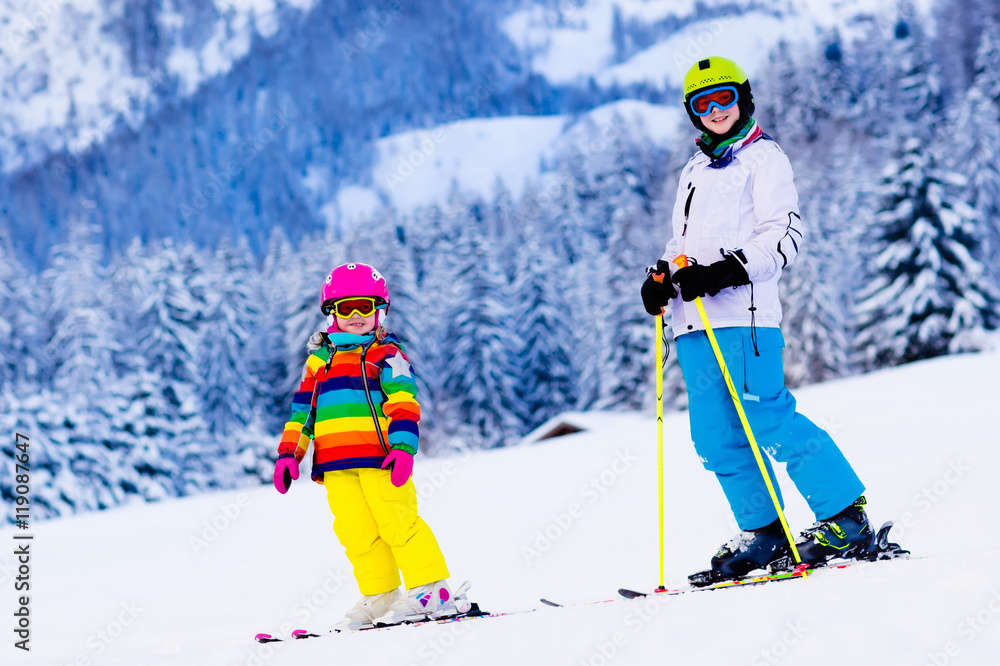 Kids skiing in the mountains