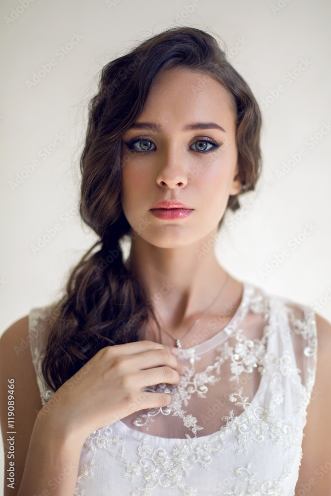 Bride beautiful woman in wedding dress - style