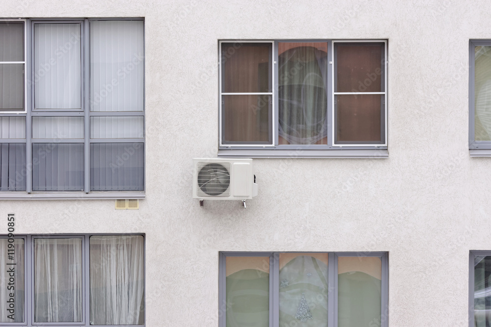 A fragment of a multi-storey residential building with installed air conditioning. Nizhny Novgorod. Russia.