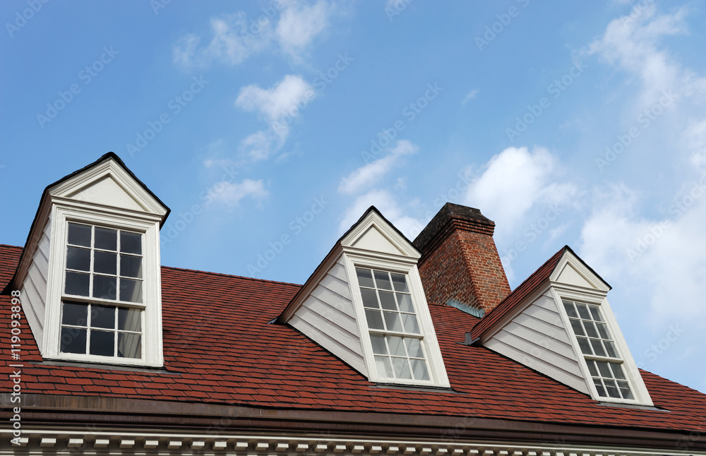 old style roof of house under the blue sky