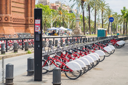 Bikes for rent on bicycle parking in Barcelona