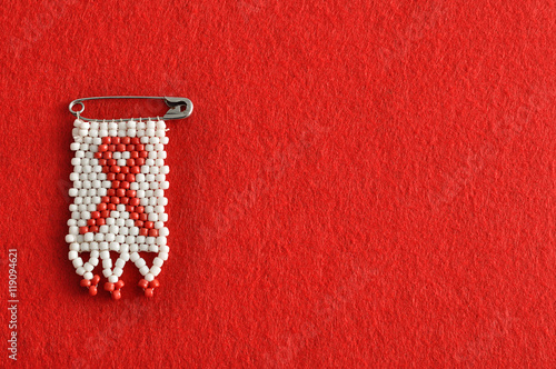 An aids ribbon as a bead work pin isolated
