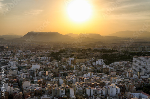 Sunset hot southern sun going behind the mountains in Alicante, Spain © Sergii Zinko