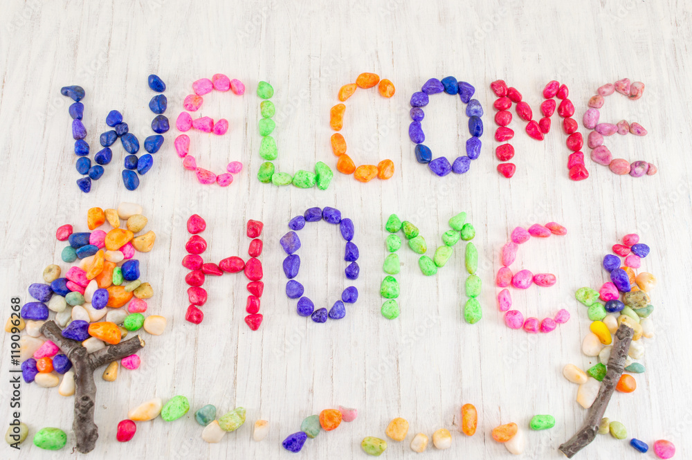 Welcome home note written with small rocks Welcome home note written with small rocks
