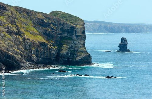 Summer Atlantic ocean rocky coastline (Algarve, Portugal).