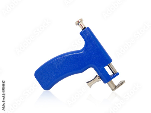 Ear piercing gun on white background

