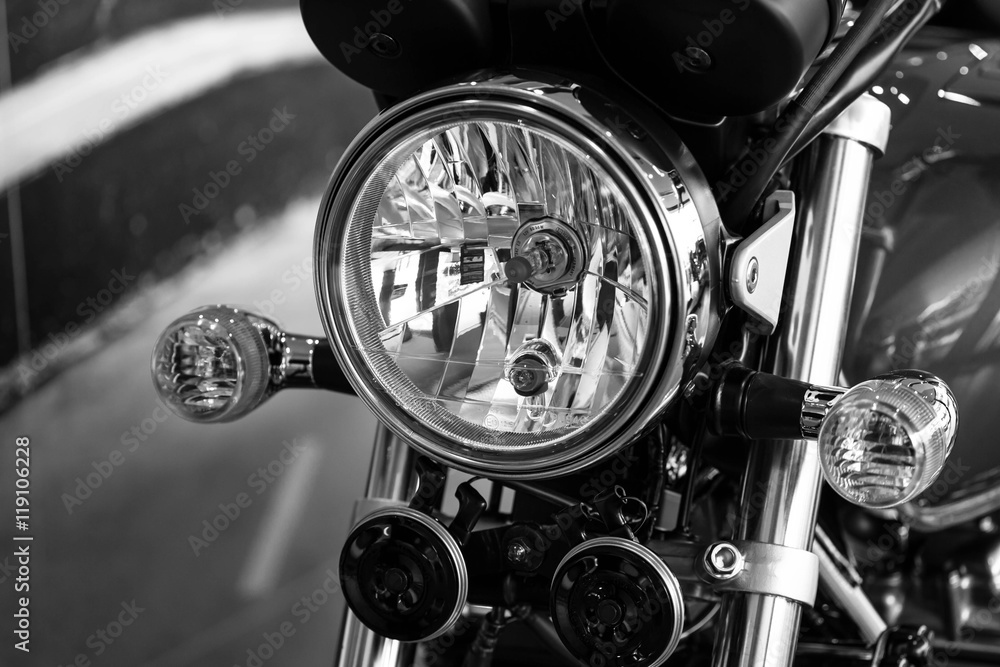 Fototapeta premium Retro motorcycle with headlights on black and white colors