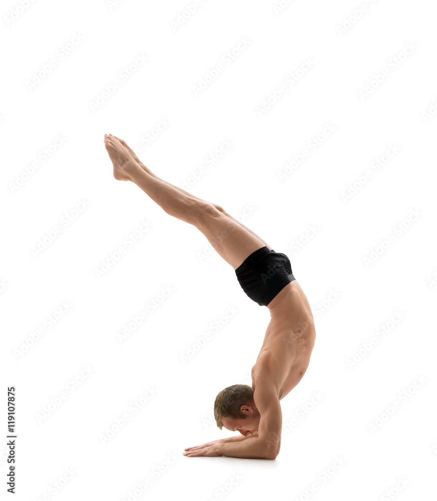 Sport. Athlete doing handstand, isolated on white Sport. Athlete doing handstand, isolated on white