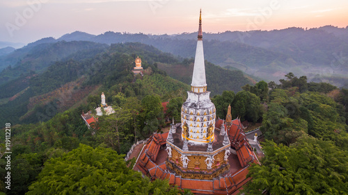 aerial photo by drone at wat Bangreang in PhangNga province.you can see Buddha with a naga on the head ,QuanYin and big pagoda on the hill top 