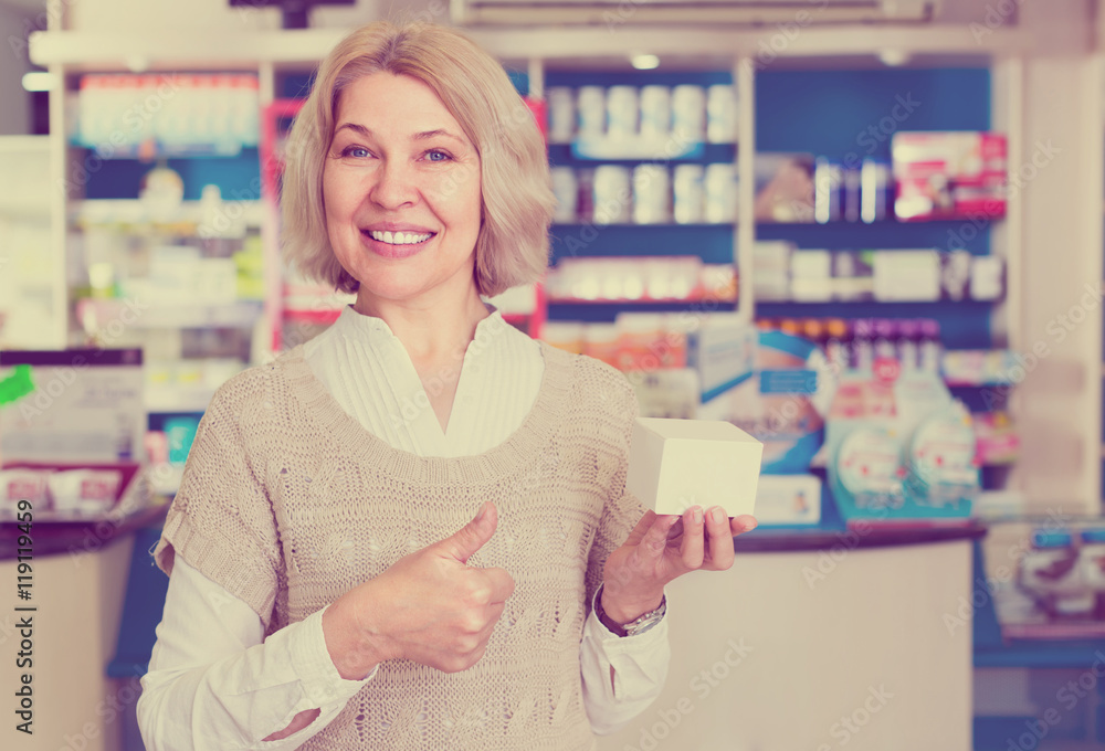 Female customer in pharmacy drugstore  .