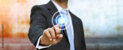 Принти на полотні Businessman touching modern tactile screen button