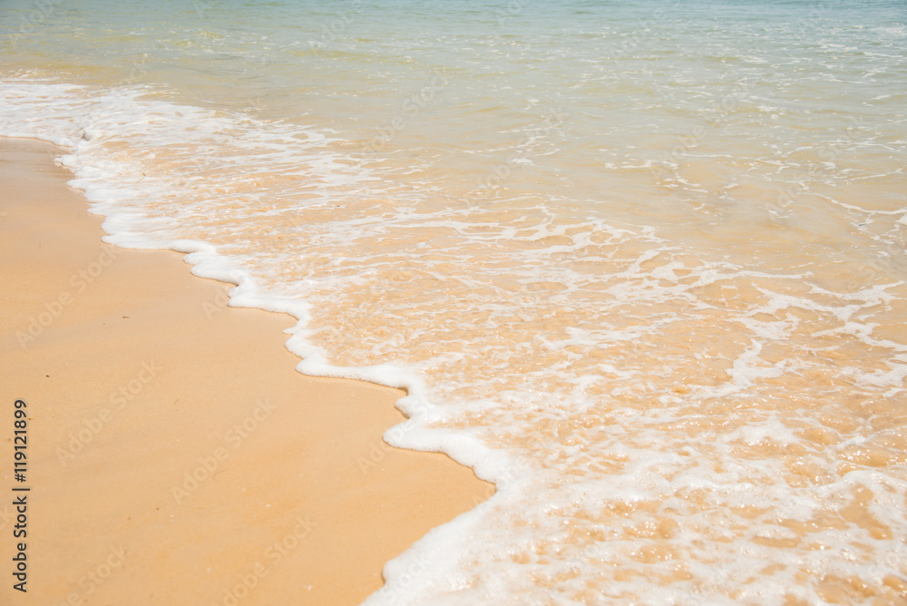 sand beach with water wave.