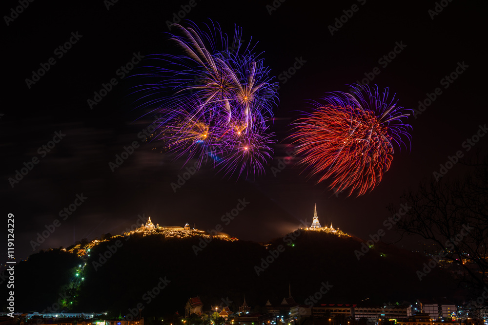 Fireworks on mountain / Fireworks at Kao Wang mountain, over the cityscape of Petchburi, Thailand