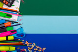 School or office stationery on colorful background. Back to . Frame, copy space. Top view. supplies