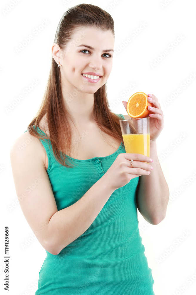 Woman drinking orange juice smiling showing oranges. Woman drinking orange juice smiling showing oranges.