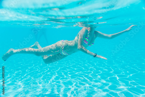woman swimming in the pool 