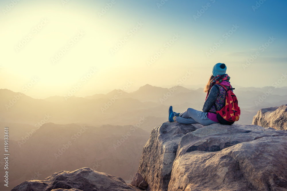 girl looks at Sinai mountains 
