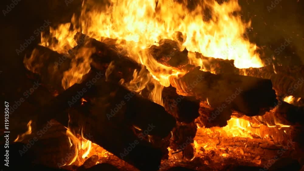 Close-up of burning logs of firewood Close-up of burning logs of firewood