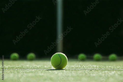 soft focus of tennis ball on tennis grass court © kireewongfoto