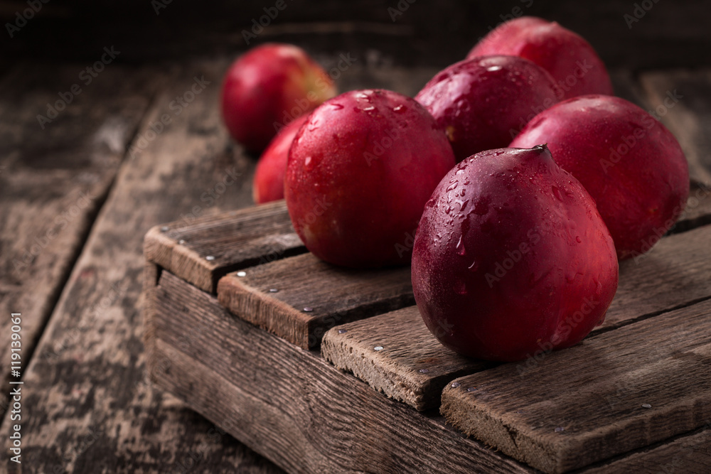 sweet fresh ripe nectarines on wooden table sweet fresh ripe nectarines on wooden table