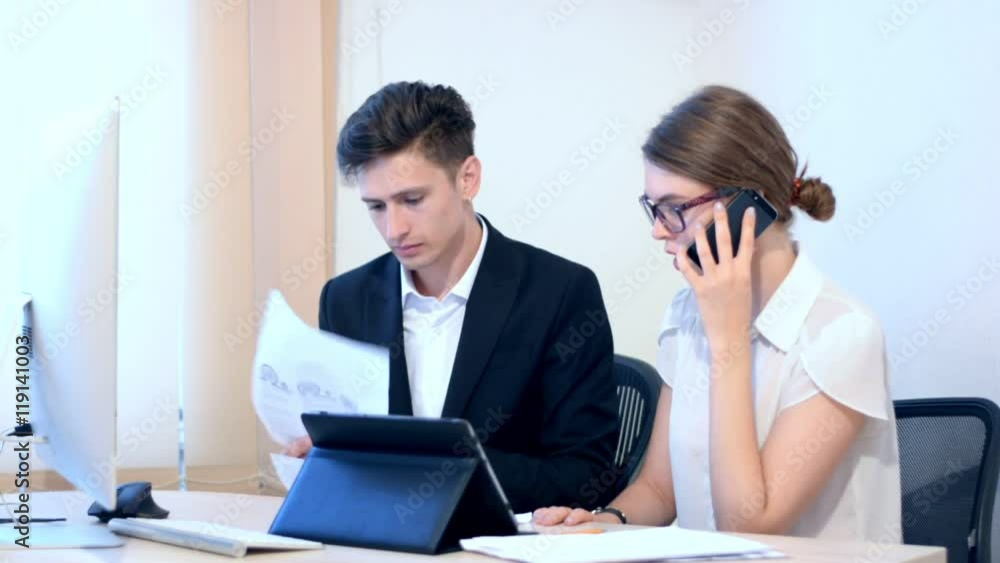 Work process at office, woman calling for information Work process at office, woman calling for information