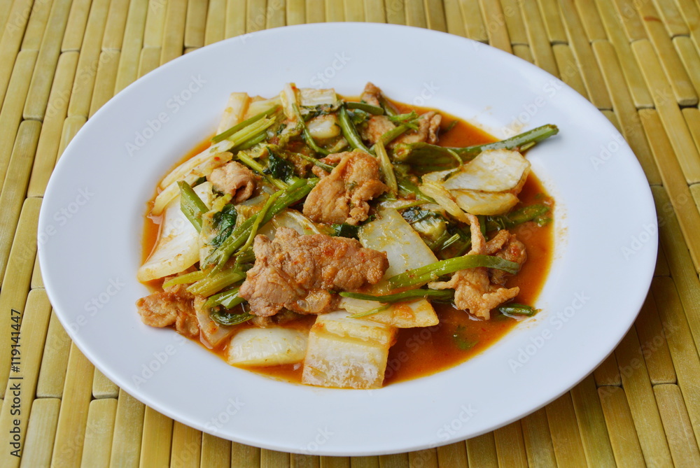 stir fried mixed vegetable and pork in sukiyaki sauce on dish