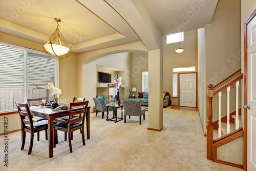 Open floor plan. Dining area and living room with entryway
