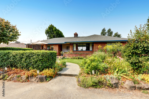One level Red brick rambler house exterior