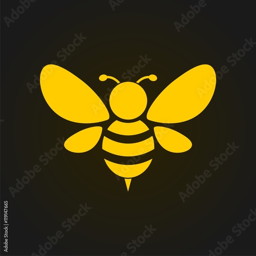 Vector golden bee icon on black background. Abstract bee silhouette