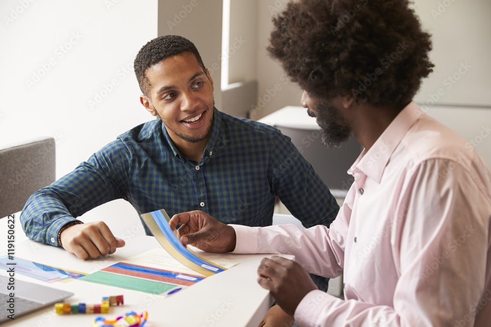 Naklejka premium Tutor Using Learning Aids To Help Student With Dyslexia