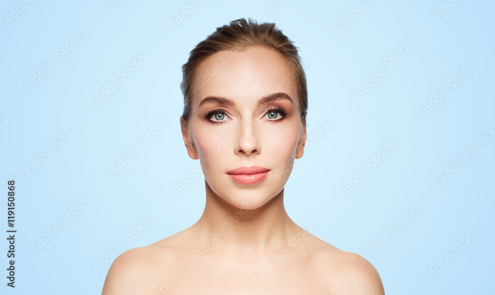 beautiful young woman face over white background beautiful young woman face over white background