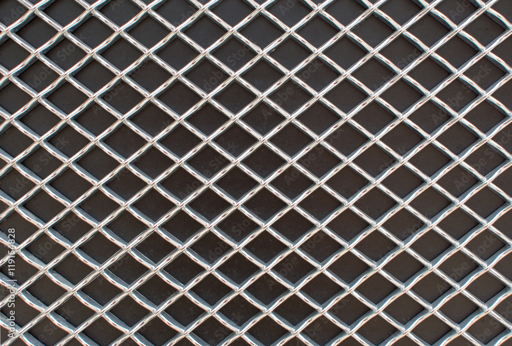 Rhombus metal pattern on black surface Rhombus metal pattern on black surface
