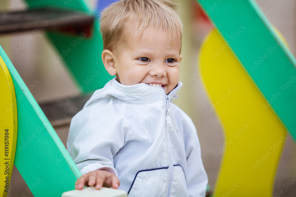 Happy toddler boy on playground Happy toddler boy on playground