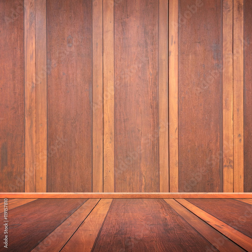 Room with a wooden floor and walls.