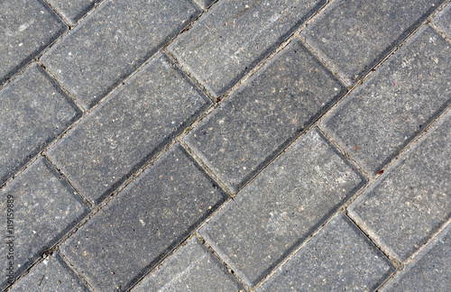 Close-up of grey pavement cobble stones.
