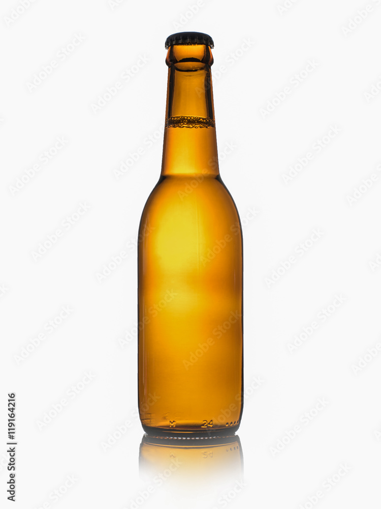 Beer glass bottle with cap isolated on white background Beer glass bottle with cap isolated on white background