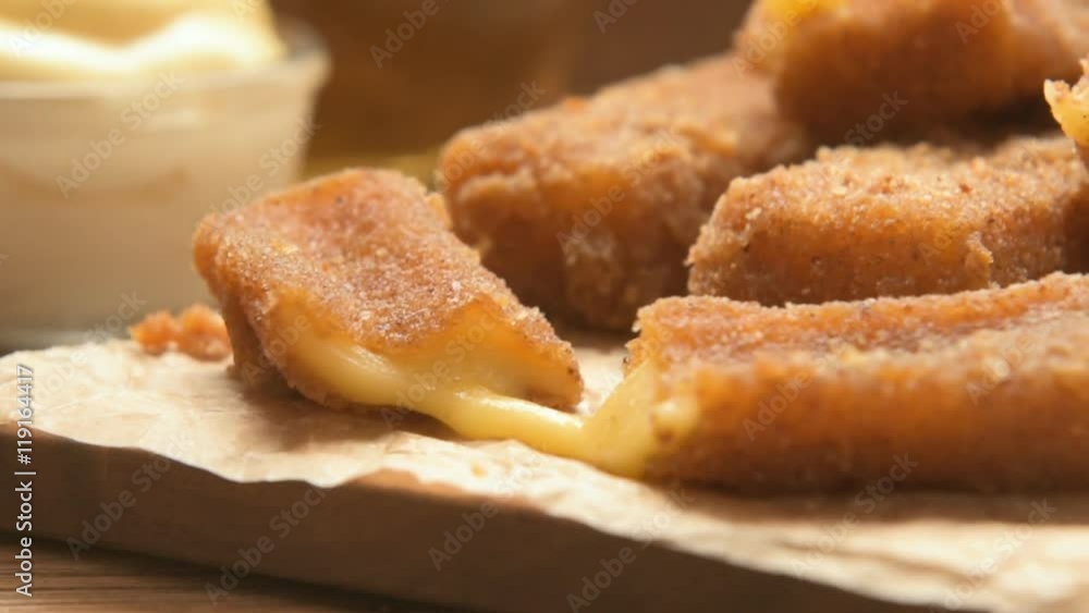 Traditional fastfood - fried cheese with sauce Traditional fastfood - fried cheese with sauce