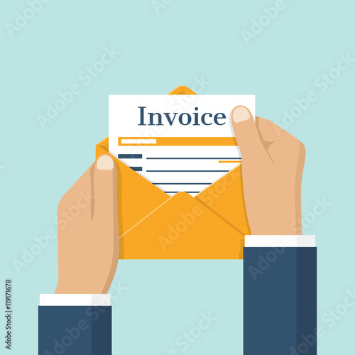 invoice envelope in hand