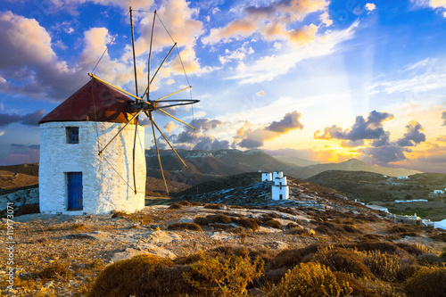 beautiful sunset over windmills. Amorgos island, Greece