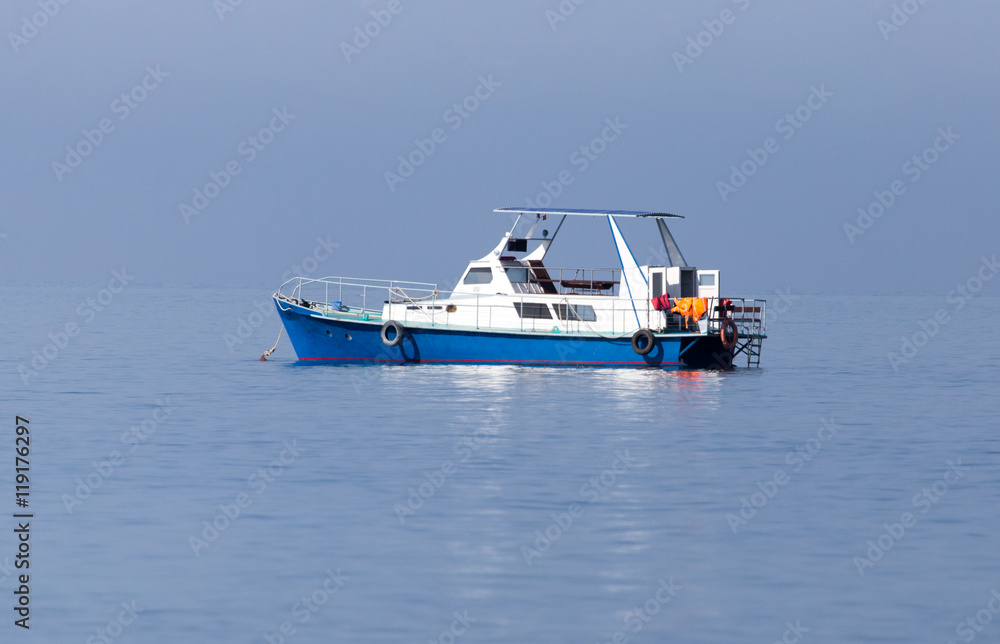 boat on the surface of the water in the sea boat on the surface of the water in the sea