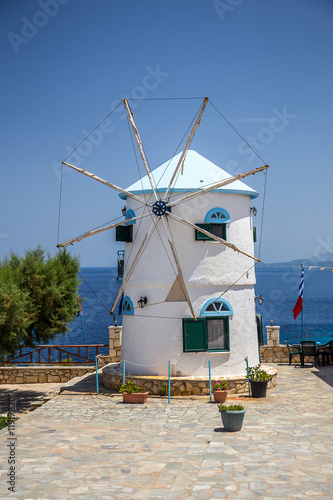 traditional old windmill on Skinari Cape, Zakynthos island, Greece